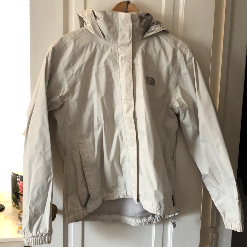 The North Face cream rain jacket